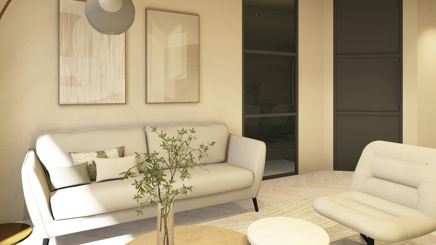 Lichte woonkamer met een beige bank en kunst aan de muur